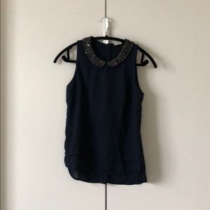 Sleeveless Decorated Collar Blouse